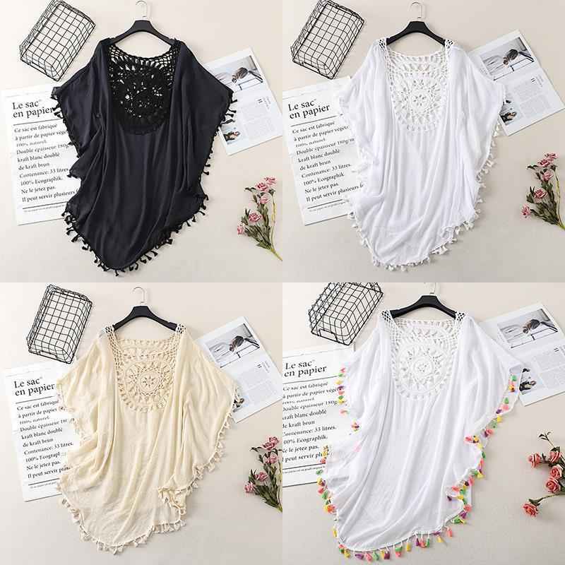 Cross-border new holiday hook solid color stitching European and American beach skirt small tassel sunscreen short sexy beach blouse