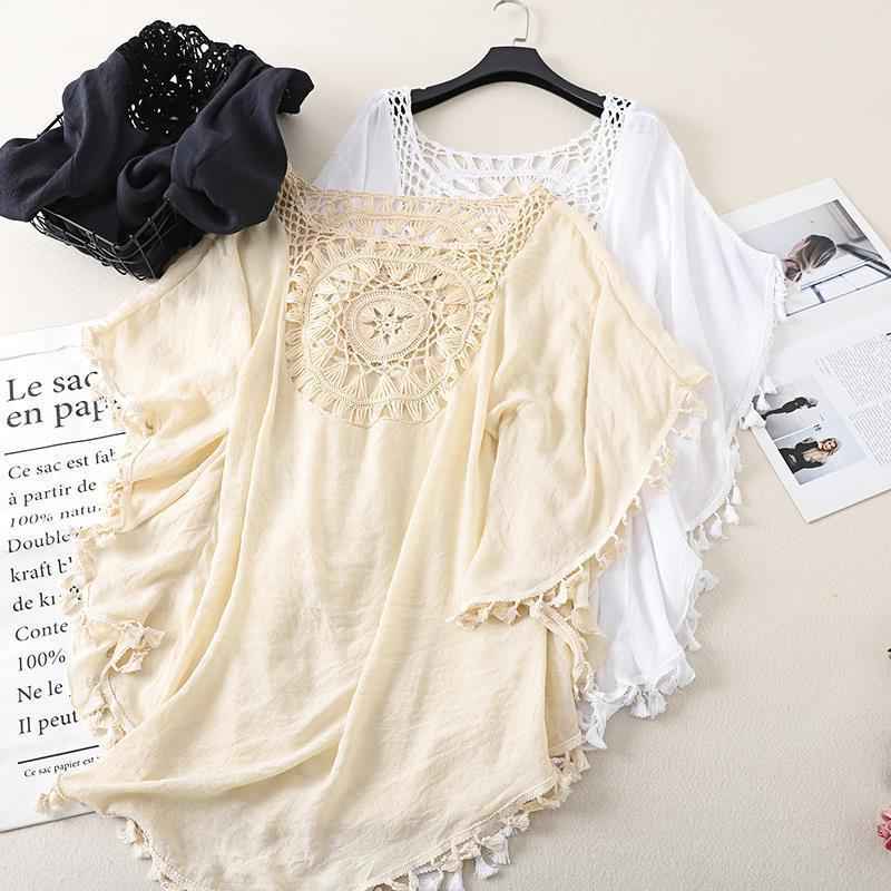 Cross-border new holiday hook solid color stitching European and American beach skirt small tassel sunscreen short sexy beach blouse